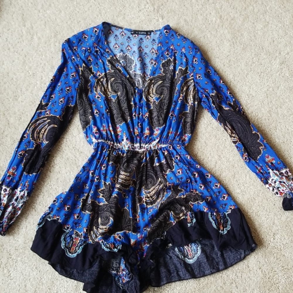 Long sleeve romper.